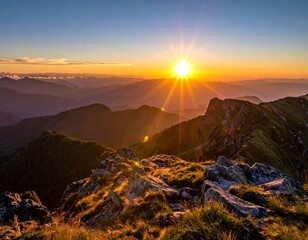 Obraz premium Breathtaking sunset over rugged mountain peaks, illuminated by the golden sun