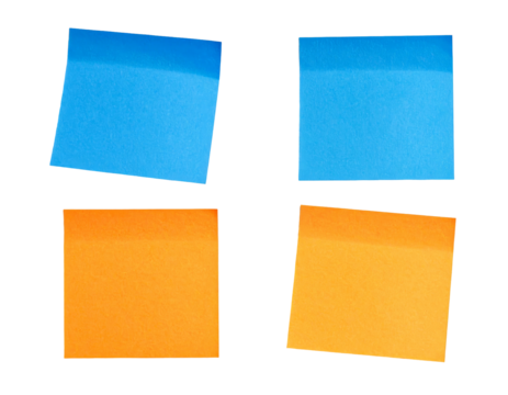 Four colorful adhesive notes, two blue and two orange, isolated on black