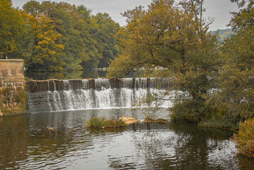 waterfall in autumn park