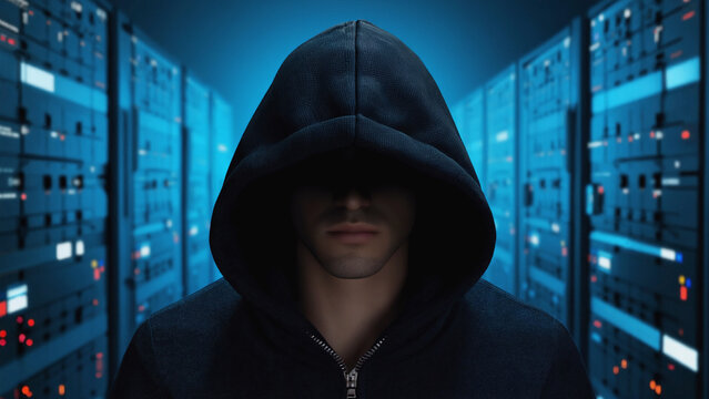 Shadowed Intruder: An enigmatic figure, shrouded in a hoodie, looms within a server room, embodying mystery and cyber security themes. 