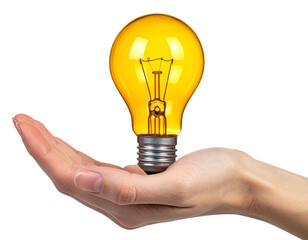 Hand holding a glowing yellow lightbulb, isolated against a solid black background
