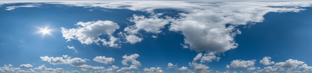blue sky with beautiful cumulus clouds. Seamless hdri panorama 360 degrees angle view with zenith for use in 3d graphics or game development as sky dome or edit drone shot © NastyaPhoto
