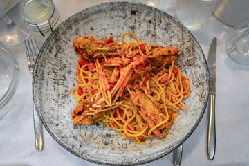 Delicious pasta pomodoro with langostino at an Italian restaurant, Nice, France