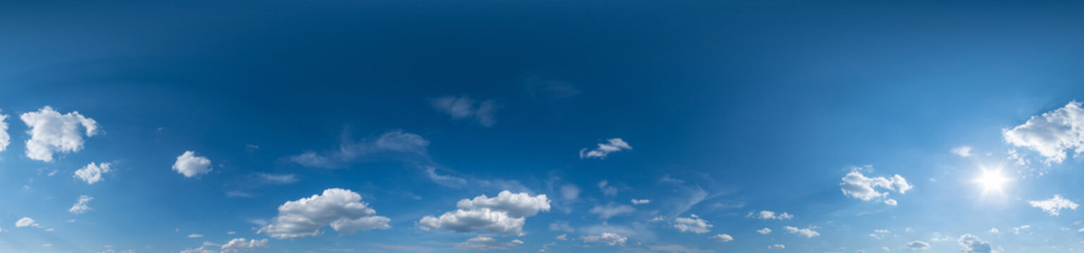blue sky hdri 360 panorama with white beautiful clouds in seamless projection with zenith for use in 3d graphics or game development as sky dome or edit drone shot for sky replacement
