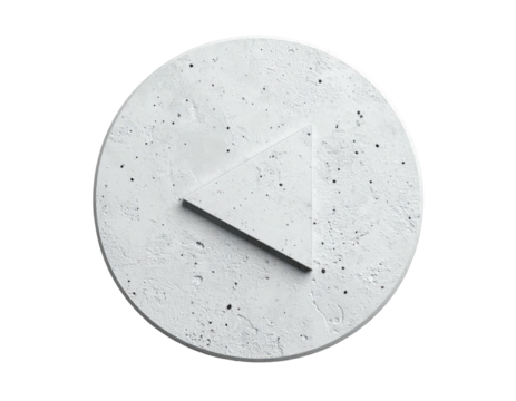 Concrete circle with inset triangle play button against black background