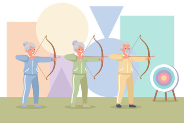 Smiling seniors enjoying archery outdoors promoting active and healthy retirement lifestyles