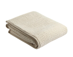 A folded cream-colored textured blanket on a solid black background, soft looking