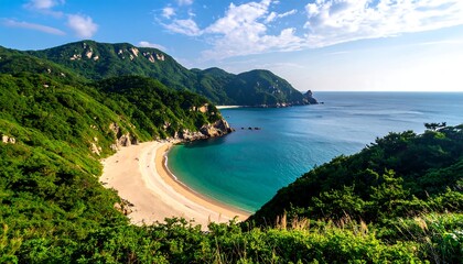 Coastal scenery with a sandy beach nestled between lush green hills and turquoise waters
