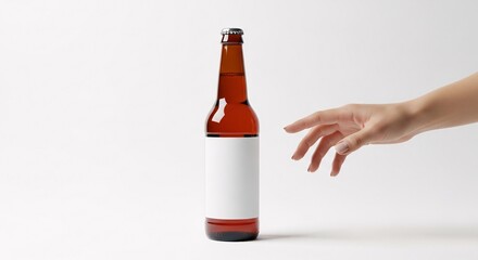 Woman's hand reaching for a craft beer bottle mockup, isolated on white background, with a blank label for design and branding