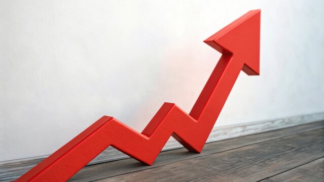 A red zigzag arrow pointing upwards symbolizes growth, progress, or increasing trends against a neutral background.