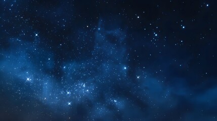 Fototapeta premium Deep blue cosmic sky filled with shimmering stars and nebulae.
