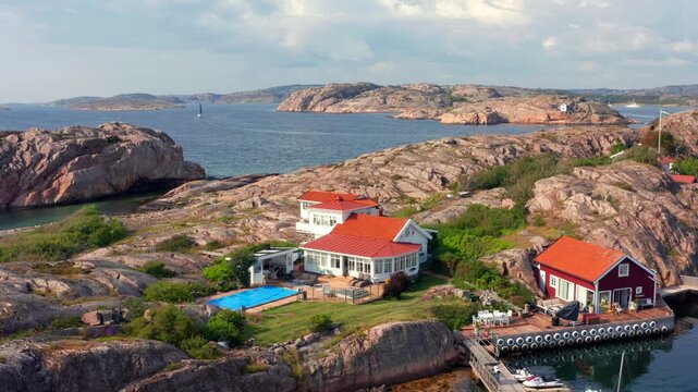 Exclusive mansion home with pool on remote granite rock island in archipelago Sweden west coast