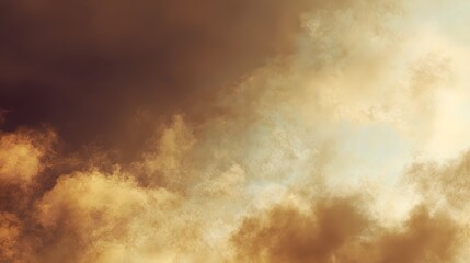 Fototapeta premium Dramatic, textured clouds with warm golden and dark brown tones dominate the sky.