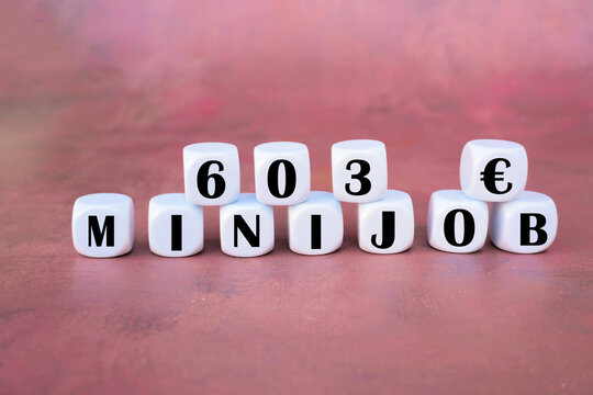 W&uuml;rfel mit der Aufschrift 603 &euro; Minijob da sich die Verdienstgrenze 2026 in Deutschland erh&ouml;ht