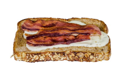 Sliced whole grain bread is generously layered with melted cheese and topped with crispy bacon strips, making it an inviting choice for a hearty breakfast /transparent PNG file/