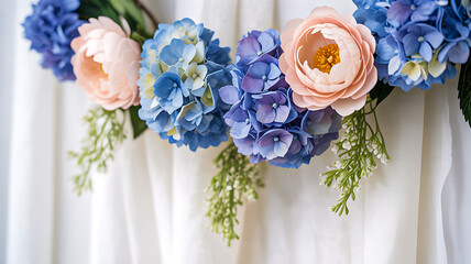 Elegant floral arrangement with soft pink peonies and vibrant blue hydrangeas perfect for wedding decor or sophisticated events