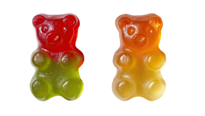 Two gelatinous teddy bear candies, one red and green, the other amber, isolated on black