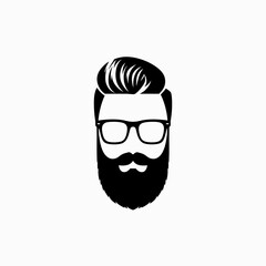 Silhouette of a person sitting at a desk with a laptop, working or studying.