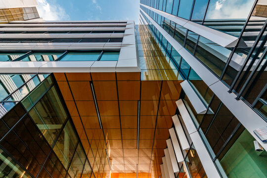 Modern Skyscraper Facade Looking Up at Blue Sky