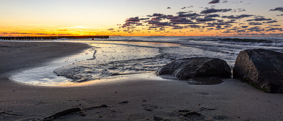 sandy beach on the embankment of Zelenogradsk