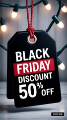 Black friday 50 percent off discount tag illuminated by festive christmas lights for holiday shopping season