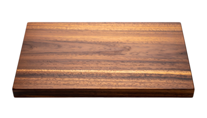 A rectangular wooden cutting board with rich wood grain against a black background
