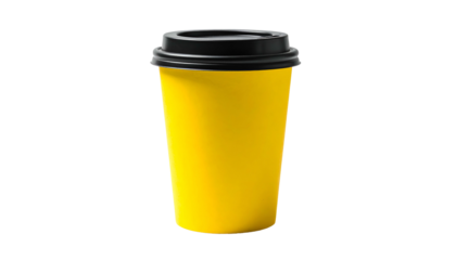 A bright yellow paper cup with a black lid against a stark black backdrop