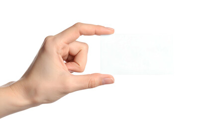 Obraz premium Human hand holding a white rectangular card against a black background. Close-up shot