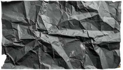 Close-up of a textured, crumpled sheet of gray paper with dramatic shadows and folds