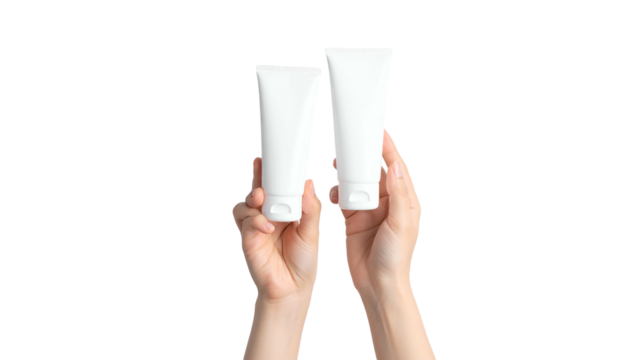 Two white tubes held by hands against a black background, suggesting product presentation
