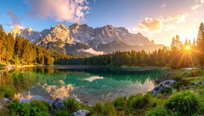 Serene alpine lake reflects majestic mountains and a vibrant sunrise