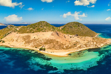 Tragonisi Islet near Petra Beach in Patmos, Greece
