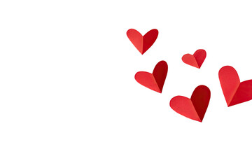 Crimson paper hearts cascading right against stark black background. Symbolic of romance