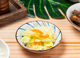 Enjoy this vibrant pickled salad, an irresistible addition to any meal. Fresh cabbage and carrots create a symphony of flavors, perfect for healthy eating campaigns.