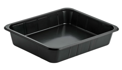 A black, empty, rectangular plastic tray sits against a black background