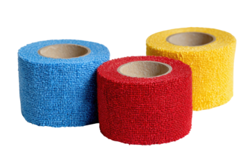 Three rolls of colorful, textured bandage wraps on a solid black background, isolated