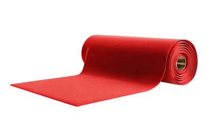 A rolled-up, elegant red carpet extends across a stark black background, emphasizing texture