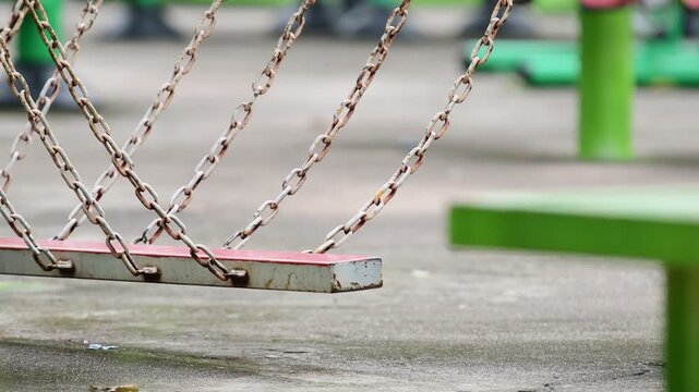 empty swing on playground