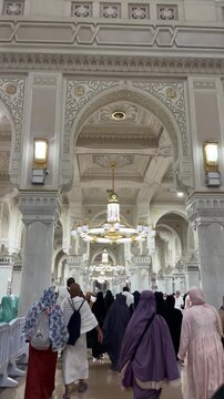 Muslim worshiper in prayer inside the Grand Mosque (Masjid al-Haram) in Makkah, Saudi Arabia, during a pilgrimage.
