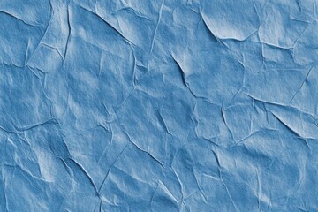 Obraz premium Blue wrinkled paper texture background for graphic design resource use