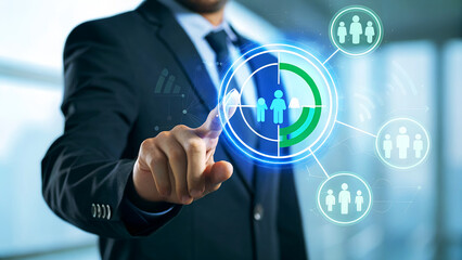 Businessman touching virtual screen with team icon for human resources management and customer relationship management concept