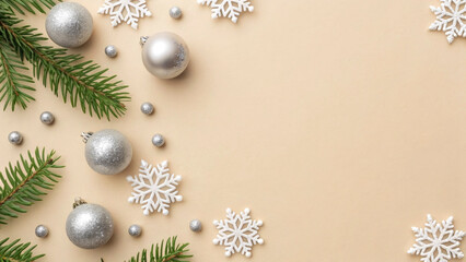 Silver ornaments and delicate snowflakes are arranged on a light background, creating a festive atmosphere perfect for New Year and Christmas celebrations in 2026