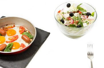 Cooking scrambled eggs. Cooking breakfast. Useful and hearty breakfast.