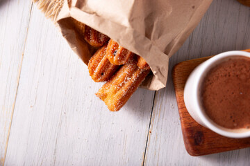 Churros. Fried wheat flour dough, a very popular sweet snack in Spain, Mexico and other countries where it is customary to eat them for breakfast or snack accompanied by hot chocolate or coffee.