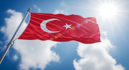 Turkish flag waving in the bright sun against a blue sky with clouds