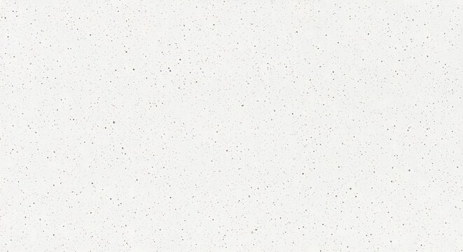 Subtle speckled texture on a white background, abstract pattern with small dark dots on a light surface