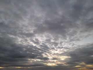 Obraz premium storm, nature, dramatic, blue, sea, sunlight, stormy, heaven, dark, weather, sky, sunset, clouds, cloud, sun, light, landscape, dusk, cloudy, color, rain, ocean, cloudscape, orange, sunrise