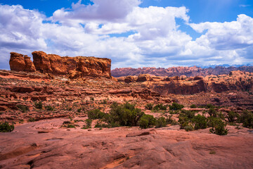 hiking the pothole arch trail near moab in utah, usa