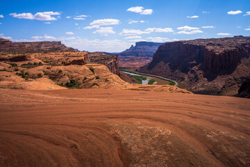 hiking the pothole arch trail near moab in utah, usa
