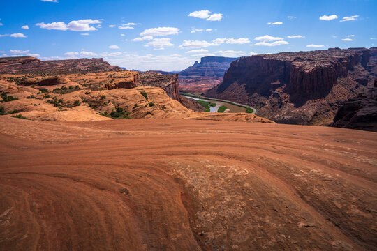 hiking the pothole arch trail near moab in utah, usa